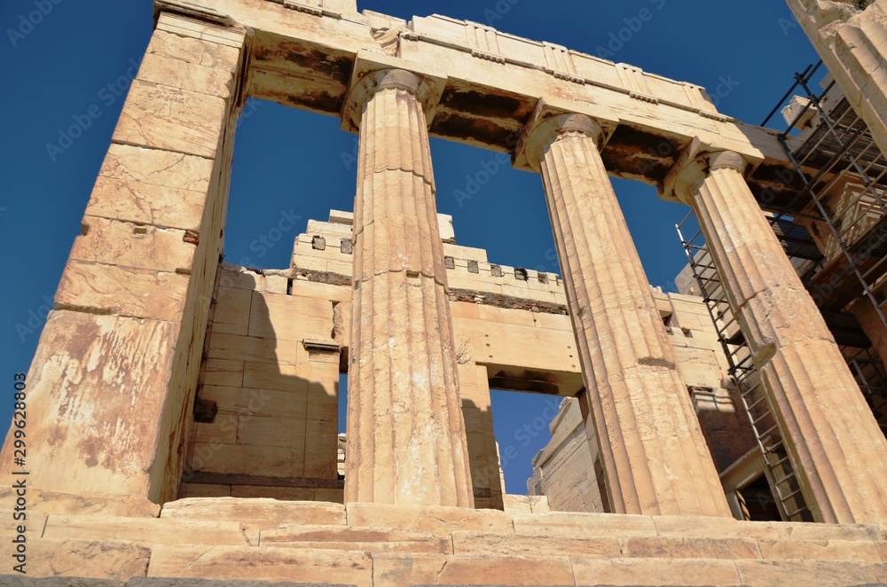 Athens, Greece, 10.28.2019. Fragment of Propylaea, entrance to the Athenian Acropolis on a bright day - world heritage site. Religious building of ancient times. 