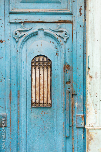 Photography blue door of a street in havana, cuba
