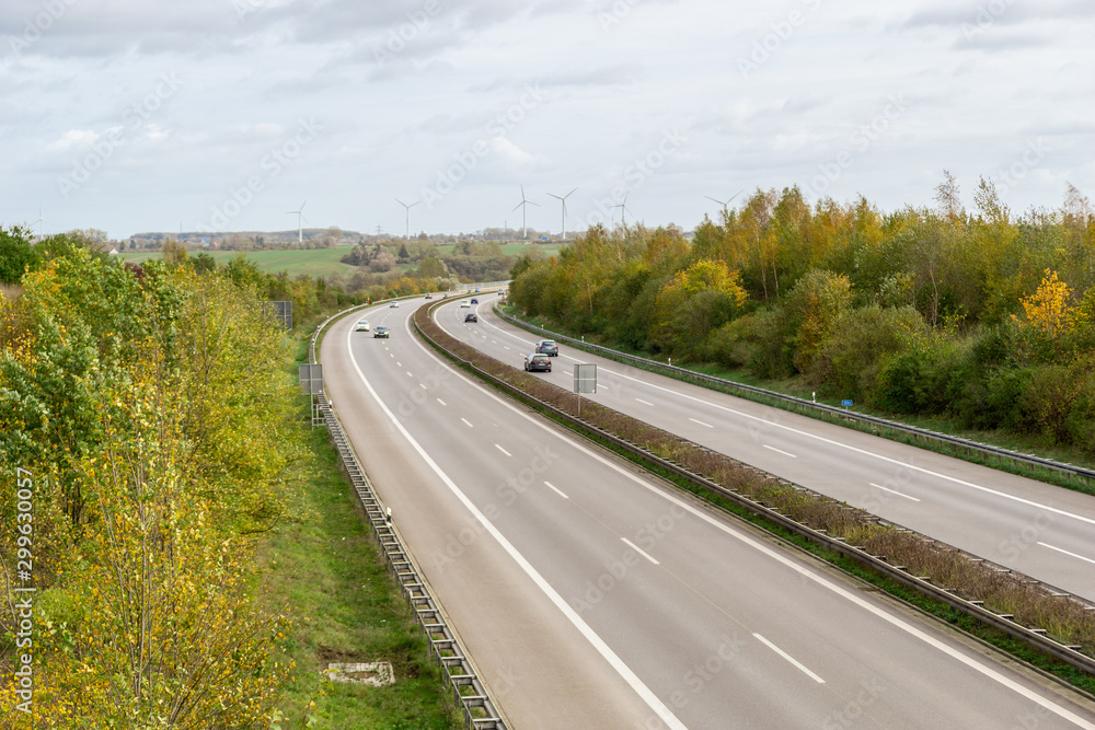 road in the countryside - german autobahn in an autumn landscape road in the countryside - german autobahn in an autumn landscape