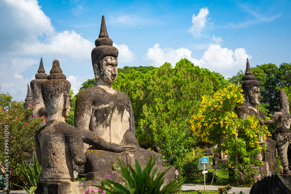 Buddha park Xieng Khouane in Vientiane, Laos. Famous travel tourist landmark of Buddhist stone statues and religious figures.