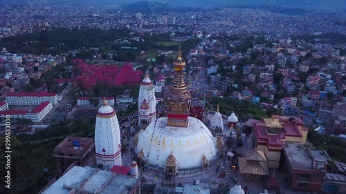 Aerial: Swayambhu temple is an ancient religious architecture atop a hill in the Kathmandu Valley, west of Kathmandu city photo
