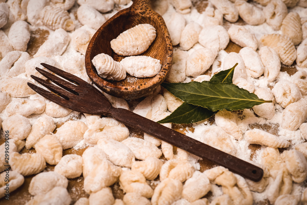 Fototapeta premium Homemade gnocchi, prepared on the table with ingredients.