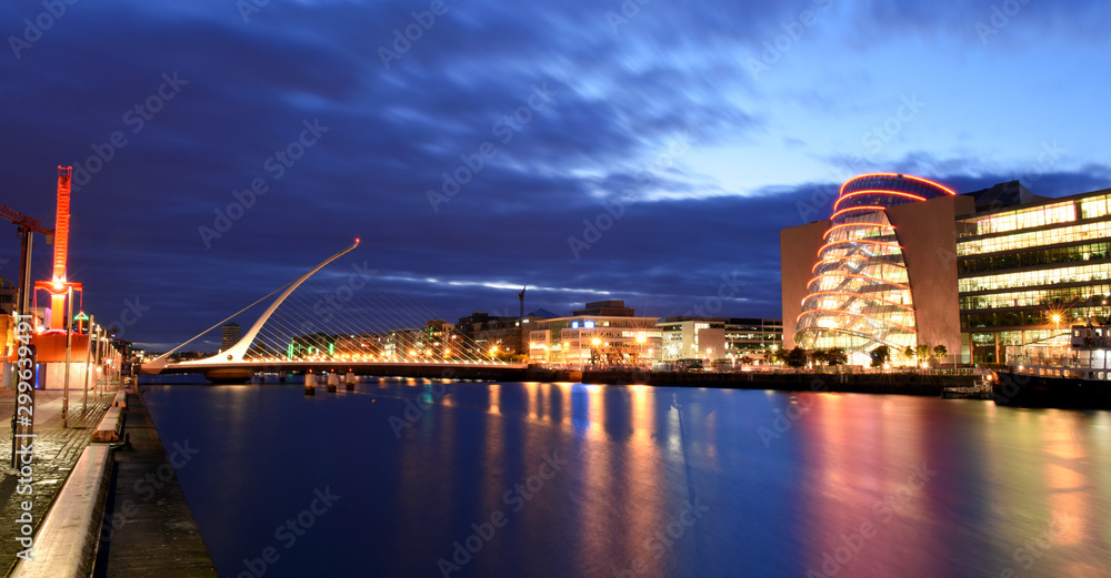Samuel Beckett Bridge at night over Liffey river and docklands, Dublin, Ireland, the harp bridge 