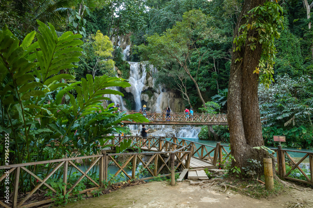 Turquoise water of Kuang Si waterfall, Luang Prabang, Laos. Tropical rainforest. The beauty of nature. Turquoise water of Kuang Si waterfall, Luang Prabang, Laos. Tropical rainforest. The beauty of nature.