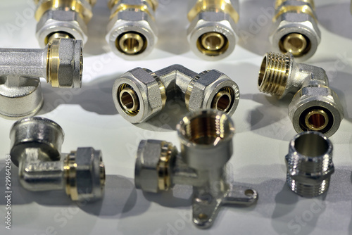 A variety of plumbing pipe connectors, adapters
