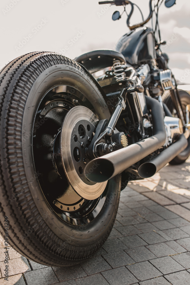 Vintage bike rear view - cool powerful custom motorcycle