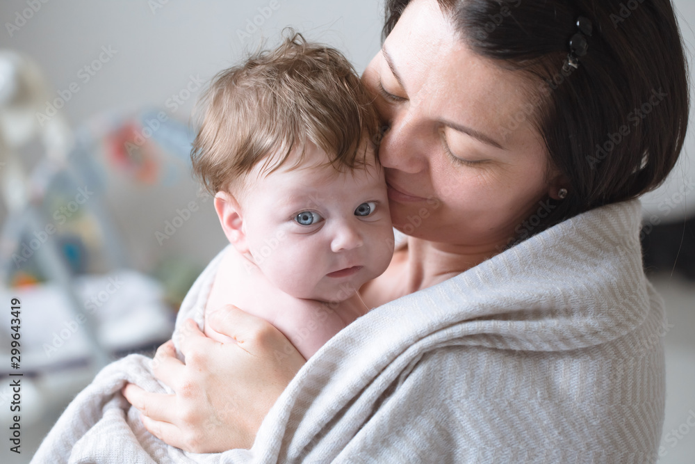 portrait of mom with cute little newborn girl. portrait of mom with cute little newborn girl.