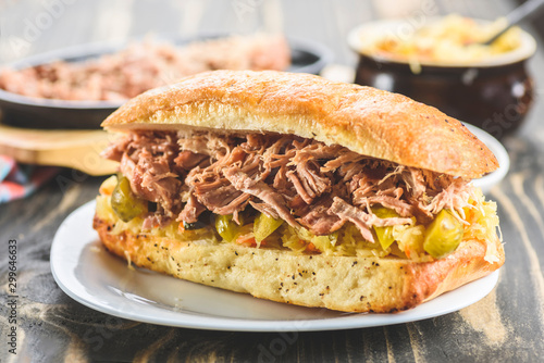 sandwich with pulled pork and sauerkraut