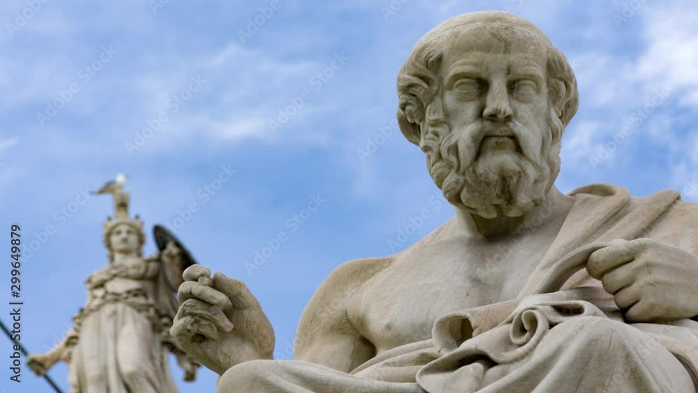 classic statues of philosopher Plato and goddess Athena far above classic statues of philosopher Plato and goddess Athena far above