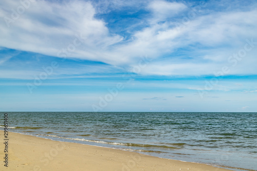 tropical beach sea with blue sky and sand.