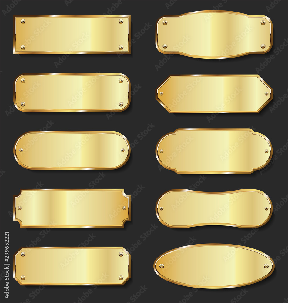 Golden metal plates collection on black background Golden metal plates collection on black background
