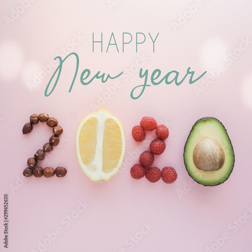 Happy New year2020 made from healthy food on pastel background, Healthy New year resolution diet and lifestyle photo