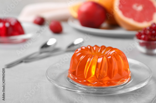 Tableau sur toile Delicious fresh orange jelly on grey table