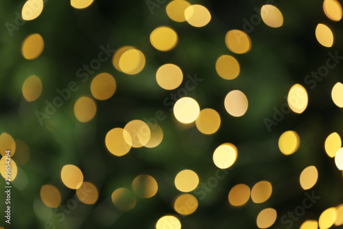 Abstract background with blurred yellow Christmas lights  bokeh effect