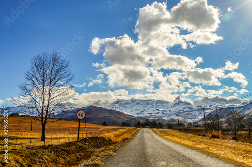 Picture perfect snow capped Drakensberg mountains and green plains in Underberg near Sani pass South Africa photo