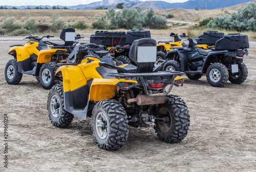 ATVs in the parking lot