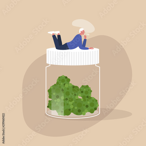 Young male character lying on a jar of cannabis flowers and smoking a joint - millennial modern lifestyle, leisure