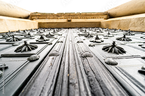 Puerta de madera tallada de estilo barroco. España. Galicia. Ourense photo