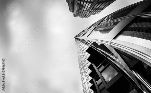 Greyscale low angle shot of high-rise buildings in the financial district of Toronto Canada