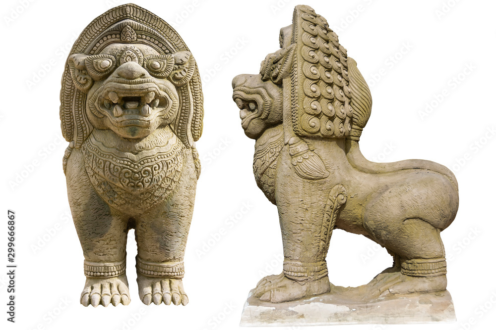 two stone statues of lions, both facing different directions. They are detailed with intricate carvings. two stone statues of lions, both facing different directions. They are detailed with intricate carvings.