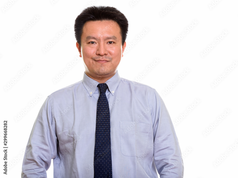 Studio shot of Japanese man isolated against white background