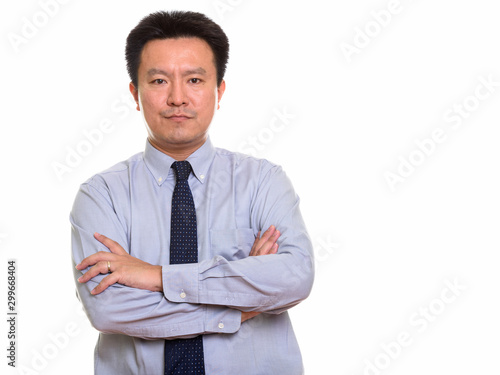 Studio shot of Japanese man isolated against white background