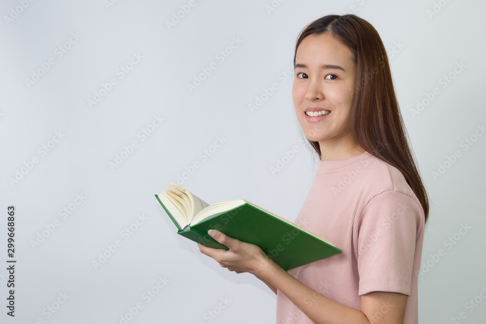 Asian college girl read book isolated on white background. Asian college girl read book isolated on white background.