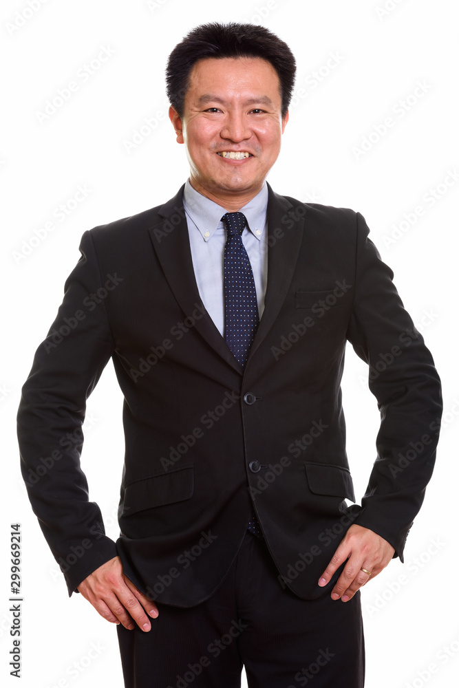 Studio shot of Japanese man isolated against white background Studio shot of Japanese man isolated against white background