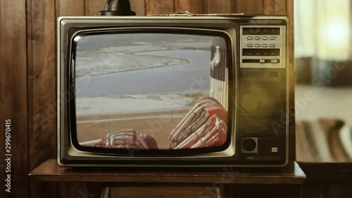 Historic launch of Apollo 11 on an Old Retro Television. Elements of this video furnished by NASA. photo