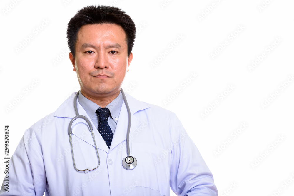 Studio shot of Japanese man isolated against white background Studio shot of Japanese man isolated against white background