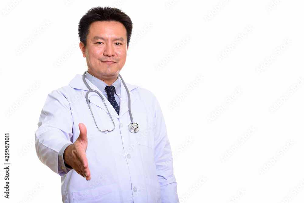 Studio shot of Japanese man isolated against white background Studio shot of Japanese man isolated against white background