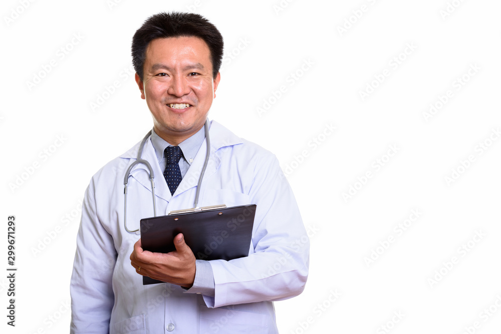 Studio shot of Japanese man isolated against white background Studio shot of Japanese man isolated against white background