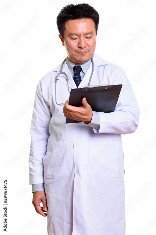 Studio shot of Japanese man isolated against white background Studio shot of Japanese man isolated against white background