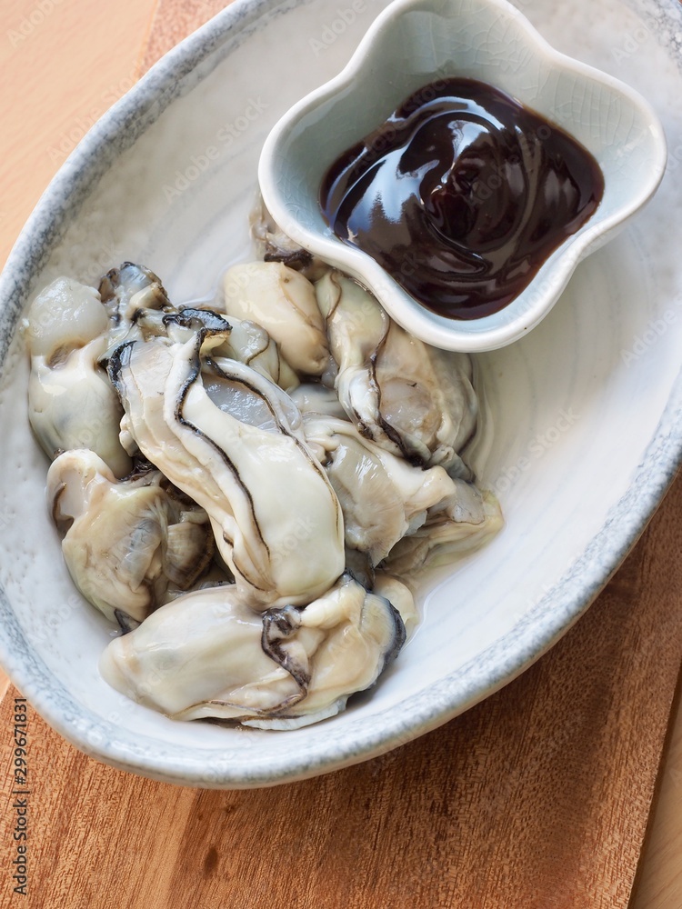 Fresh seafood oysters and oyster sauce Fresh seafood oysters and oyster sauce