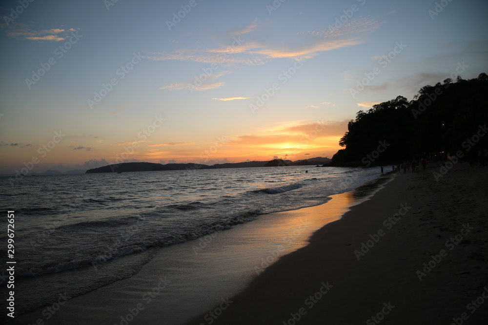 Tropical sunset on the beach. Ao-Nang Krabi Thailand