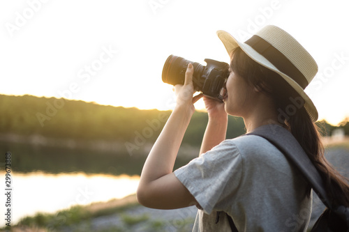woman looking through binoculars © thitipong