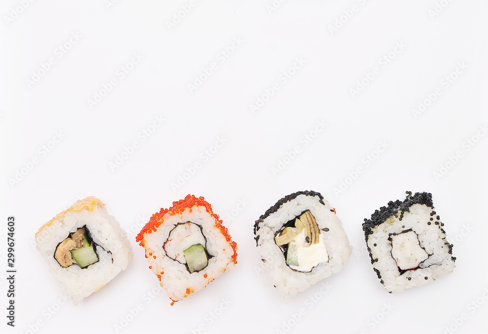 Japanese rolls on white background.