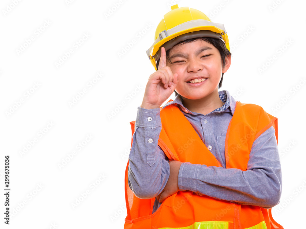 Studio shot of Japanese boy isolated against white background Studio shot of Japanese boy isolated against white background