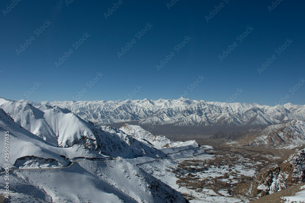 View landscape with Himalayas mountains range between Khardung La road pass go to Nubra Valley in Hunder city while winter season at Leh Ladakh in Jammu and Kashmir, India