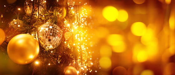 Christmas tree and blur bokeh lights background. Xmas and happy new year. Use for greeting card, cover, banner, header template.