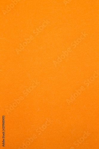 This is a photograph of a Neon Orange construction paper