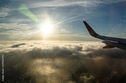 Flying above the clouds, view from the airplane
