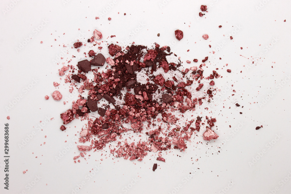 This is a photograph of Metallic Pink and Burgundy Eyeshadow and Dark Matte Purple Eyeshadow isolated on a White background