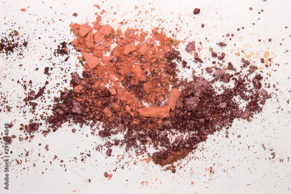 This is a photograph of a Metallic Purple and Peach Powder Eyeshadow isolated on a White Background