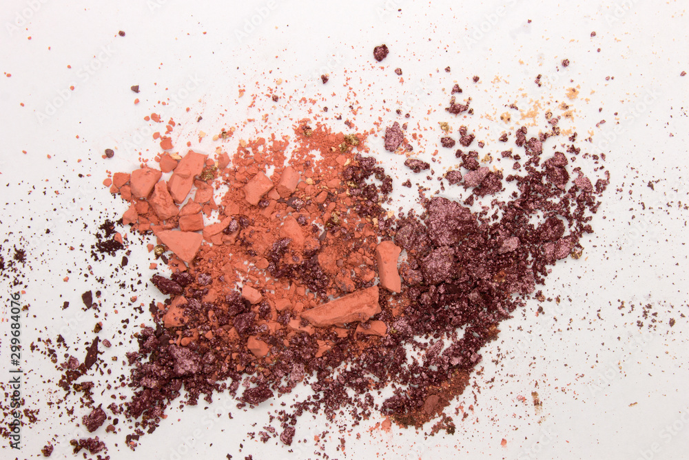 This is a photograph of a Metallic Purple and Peach Powder Eyeshadow isolated on a White Background This is a photograph of a Metallic Purple and Peach Powder Eyeshadow isolated on a White Background