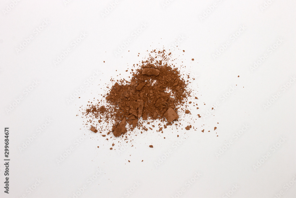 This is a photograph of a Matte Brown Powder Eyeshadow isolated on a White Background This is a photograph of a Matte Brown Powder Eyeshadow isolated on a White Background