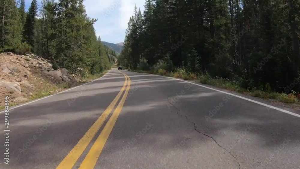 Independence pass climb featuring trees and twisty roads. Independence pass climb featuring trees and twisty roads.