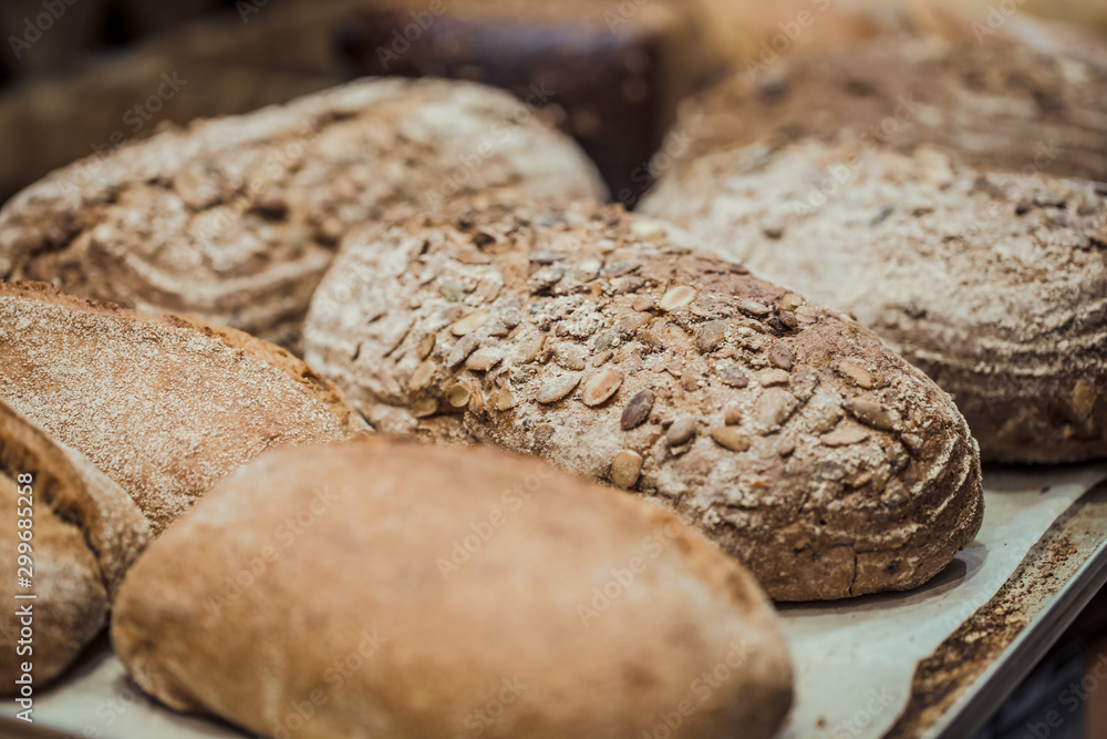 Fresh bread on the counter in the store, close-up . Fresh bread on the counter in the store, close-up .