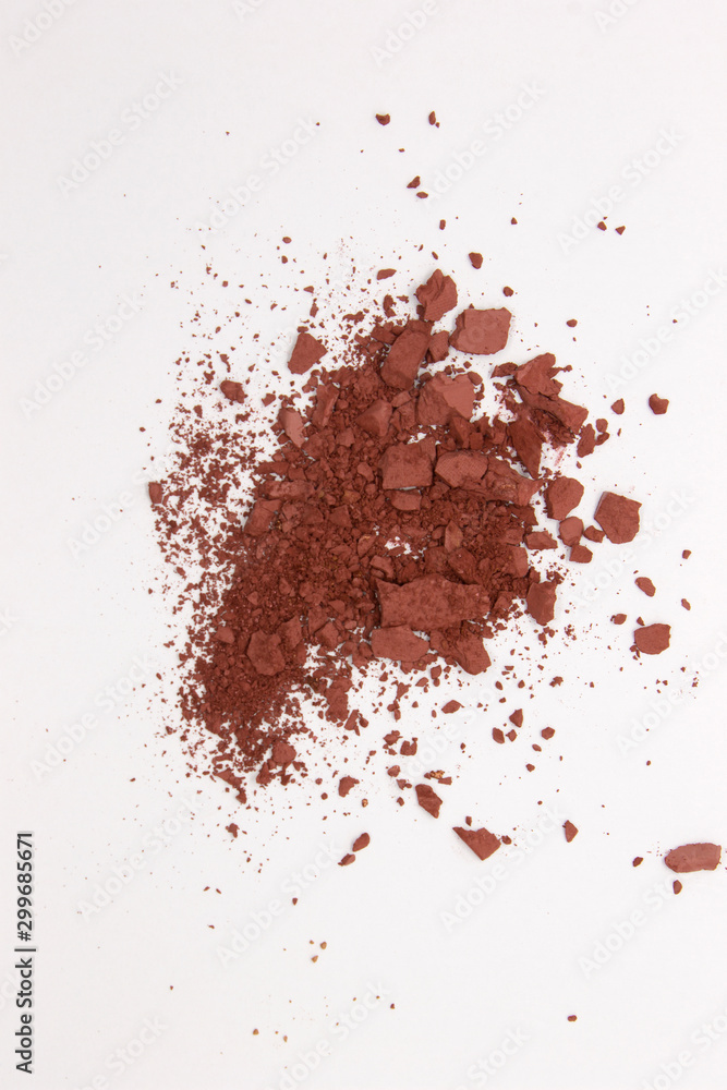 This is a photograph of a Burnt Umber Powder Eyeshadow isolated on a White Background