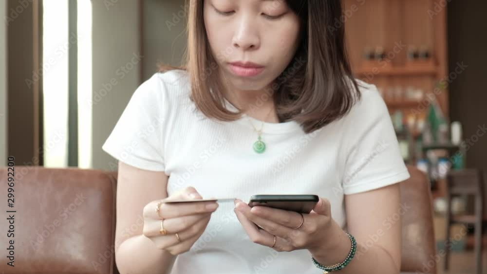 Woman using online banking with smart phone. Woman using online banking with smart phone.